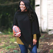black wofford poncho with gold top