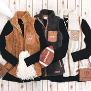 camel, charcoal, and ivory sherpa vests with virginia tech logo