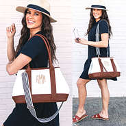 monogrammed expandable purse with crossbody strap on shoulder