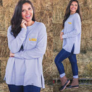 lsu sweatshirt with side slits on model with jeans and boots