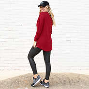 back of crimson long sleeve pocket tee with baseball hat