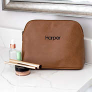 personalized cosmetic bag on counter with name