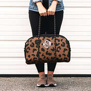 hickory leopard neoprene gym bag in hands