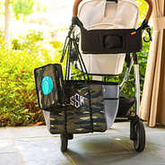neoprene diaper bag with matching neoprene diaper carry-all on stroller