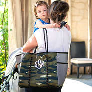 mom and baby with monogrammed neoprene diaper bag