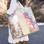 metallic leopard massive beach bag on shoulder