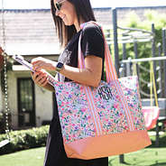 coral floral bag with girl