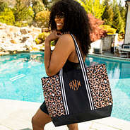cheetah large zip top tote on shoulder
