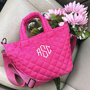 hot pink diamond quilted crossbody in car