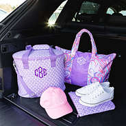 packable duffel bag in purple splish splash with purple shell cooler car trunk shot