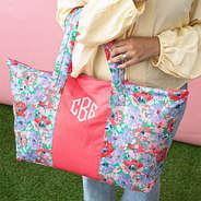 coral botanical packable weekend duffel on arm