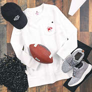 white richmond quilted sweatshirt with sneakers and hat