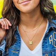 layered pendant necklace on neck - gold