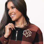 monogram close up details of hickory and black pullover