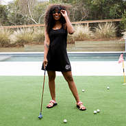 black monogrammed exercise dress at mini golf