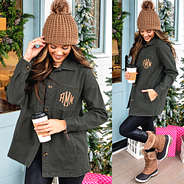 faded green monogrammed shirt jacket with chunky knit beanie