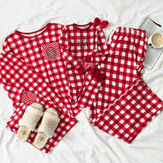 family christmas pajamas flat lay