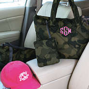 quilted camo tote set inside car with hot pink cap
