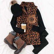 monogrammed leopard sherpa vest with chunky knit beanie and leopard bottom duck boots