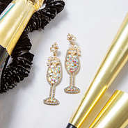 gold sparkle champagne earring with party supplies