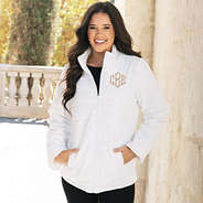 girl wearing monogrammed white puffer jacket