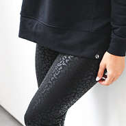 onyx leopard faux leather leggings up close