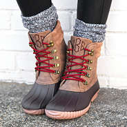 close up of monogrammed holiday red duck boots