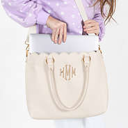 bone laptop tote bag on shoulder