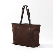 angled stuido shot of the suede tote
