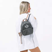 Studio Shot of Blonde wearing Grey Mini Backpack