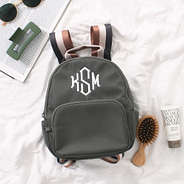 charcoal mini backpack on white sheet