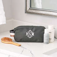 charcoal classic cosmetic case on counter