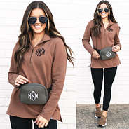 split of brunette wearing charcoal belt bag with pullover