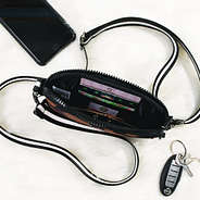 inside card pockets of neoprene phone crossbody in leopard