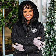 bundled up in monogrammed winter coat