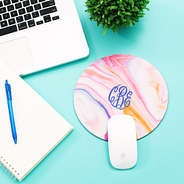 8' mouse pad with laptop on blue paper