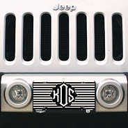 black and white striped monogrammed license plate on jeep