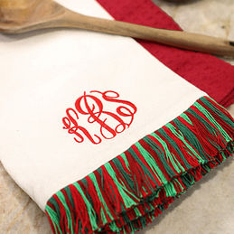 https://images.marleylilly.com/profiles/ml-product-list/product/106285/LJA-ivory-dish-towel-set-with-wood-spoon-close-up.jpg