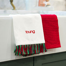 https://images.marleylilly.com/profiles/ml-product-list/product/106285/aAN-ivory-dish-towel-set-on-farmhouse-sink-with-name.jpg