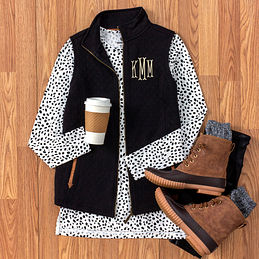 dropped hem layering tee tunic with spring leopard and black monogrammed vest and duck boots