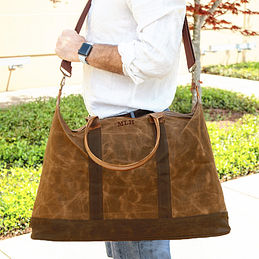 Waxed canvas monogrammed men's travel bag for outdoor adventures