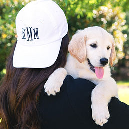 white baseball hat with puppy