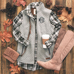 gray quilted monogrammed vest with olive plaid top