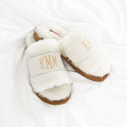 monogrammed faux fur slippers in ivory