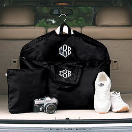 https://images.marleylilly.com/profiles/ml-product-list/product/91605/akt-monogrammed-packable-garment-bag-and-duffel-in-black-in-trunk.jpg