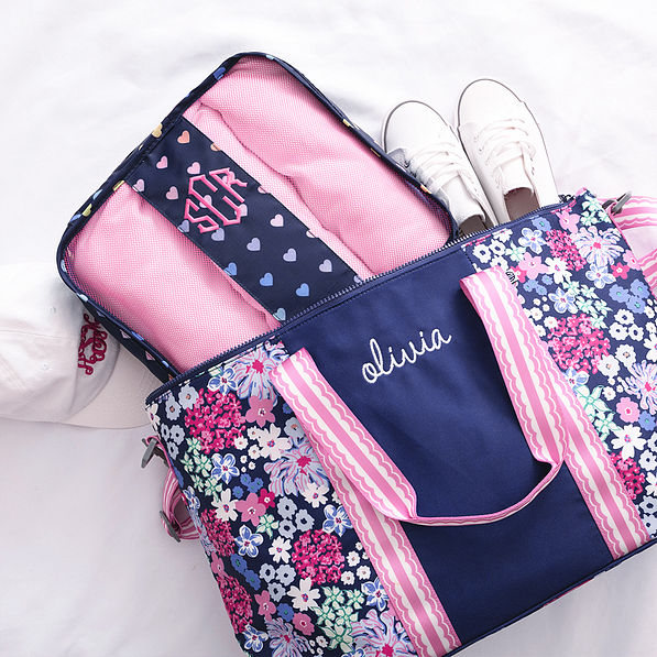 navy rainbow hearts packing bag with weekend bag