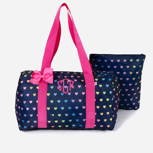 https://images.marleylilly.com/profiles/mlk-product-detail/product/110123/G22-monogrammed-kids-activity-bag-in-navy-rainbow-hearts-update.jpg