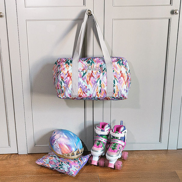 jewel ikat activity bag hanging with roller skates