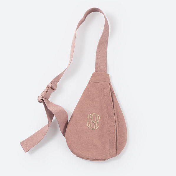 monogrammed kids sling pack in blush