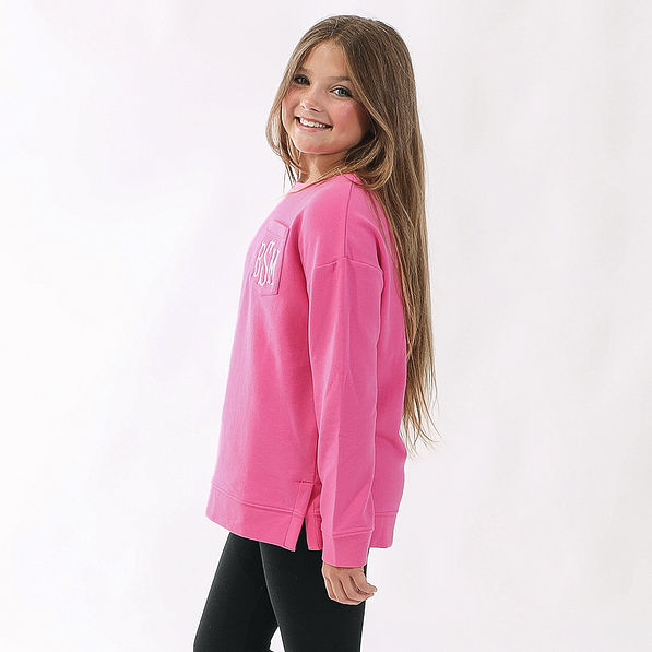 youth girl wearing hot pink sweatshirt
